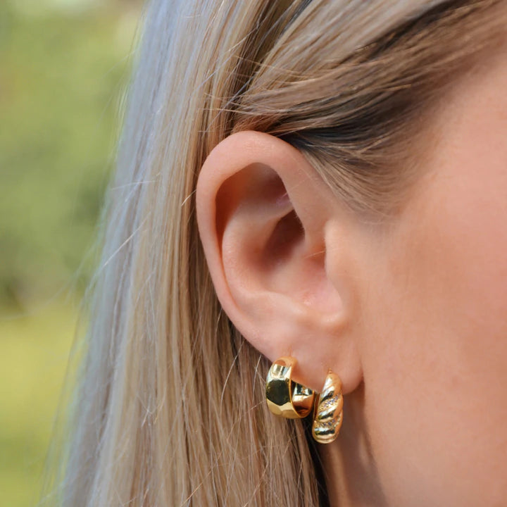 Guld øreringe